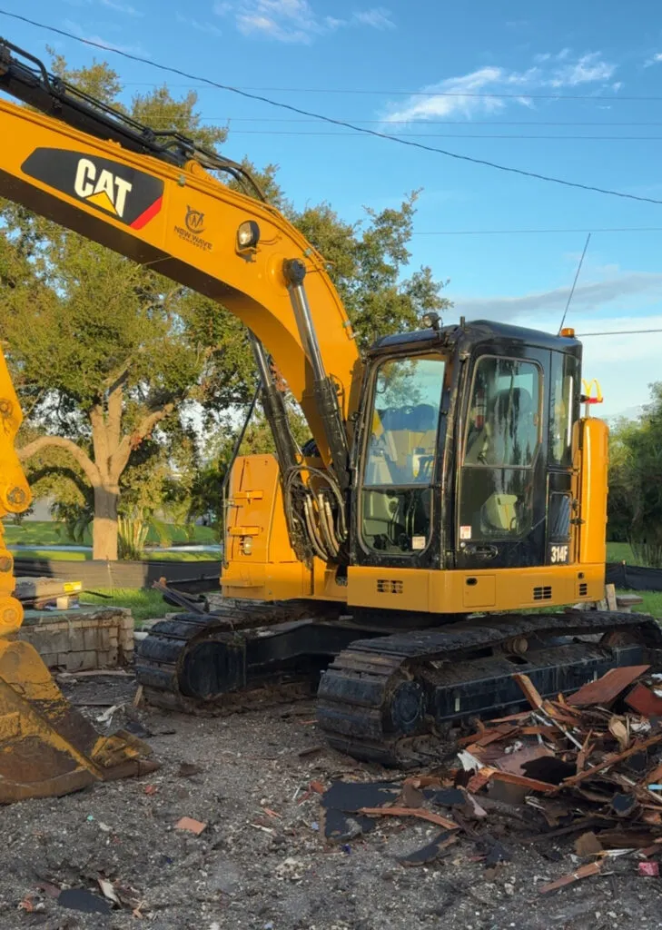 New Wave Concepts CAT excavator on a Southwest Florida job site