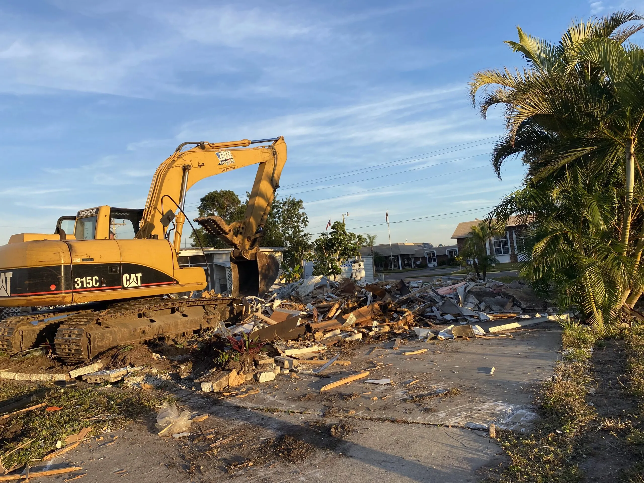 Home demolition at golden hour in Cape Coral, FL