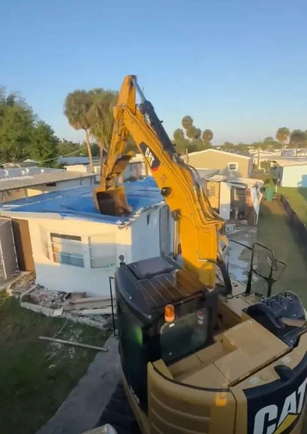 Mobile home demolition in progress